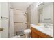 Recently updated bathroom with tile shower, grab bar, modern fixtures, and vanity at 180 Broadmoor Rd, Lake Mary, FL 32746