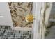 Close-up of a unique glass doorknob with gold specks, showcasing vintage charm and design at 180 Broadmoor Rd, Lake Mary, FL 32746