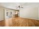A large living room with open floor plan leading to kitchen with access to outdoor area at 180 Broadmoor Rd, Lake Mary, FL 32746
