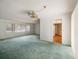Open concept living room with hardwood flooring and clear view into kitchen at 180 Broadmoor Rd, Lake Mary, FL 32746