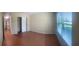 Bedroom with tile floors, closet, and bright natural light from window at 200 Saint Andrews Blvd # 2306, Winter Park, FL 32792