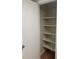 Closet offering built-in open shelving for storage solutions at 200 Saint Andrews Blvd # 2306, Winter Park, FL 32792