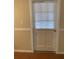 Neutral colored door with blinds in the window and trim at 200 Saint Andrews Blvd # 2306, Winter Park, FL 32792
