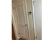 Hallway featuring built-in cabinets and a closet with modern doors at 200 Saint Andrews Blvd # 2306, Winter Park, FL 32792