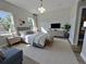 Comfortable main bedroom with a large bed, soft lighting, and serene decor for a relaxing retreat at 2406 Sw 163Rd Pl, Ocala, FL 34473