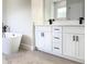 Bathroom featuring double vanity, soaker tub and modern finishes at 2697 Sw 165St Rd, Ocala, FL 34473