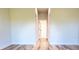 Hallway with luxury vinyl plank flooring and access to other rooms in the home at 2697 Sw 165St Rd, Ocala, FL 34473