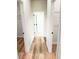 Hallway with luxury vinyl plank flooring and access to closets and other rooms at 2697 Sw 165St Rd, Ocala, FL 34473