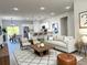 Bright living room featuring an open layout with modern decor and ample natural light at 2697 Sw 165St Rd, Ocala, FL 34473