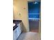 A bathroom with a mosaic floor and white vanity at 708 Palenci Ct, Winter Springs, FL 32708