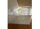 Cozy kitchen with white cabinets, laminate countertops, and essential appliances at 708 Palenci Ct, Winter Springs, FL 32708