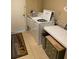 A tidy laundry room with a washer and dryer at 708 Palenci Ct, Winter Springs, FL 32708