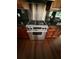 Stainless steel oven with granite countertop and hardwood floors at 708 Palenci Ct, Winter Springs, FL 32708