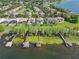 Luxury waterfront homes with private pools and docks, set amidst lush greenery, offering an unparalleled lakeside lifestyle at 7624 Pointe Venezia Dr, Orlando, FL 32836