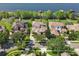 Elegant waterfront homes feature private docks and lush landscaping, creating a serene and upscale lakeside community at 7624 Pointe Venezia Dr, Orlando, FL 32836