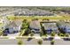 This aerial view captures the home's appealing curb appeal, manicured landscaping, and neighborhood at 7644 Fairfax Dr, Kissimmee, FL 34747