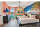 Themed bedroom with twin beds, vibrant walls, and beach-inspired decor at 7644 Fairfax Dr, Kissimmee, FL 34747