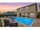 Backyard pool and patio, ideal for outdoor relaxation and entertaining with ample seating at 7644 Fairfax Dr, Kissimmee, FL 34747