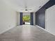 Spacious bedroom with a ceiling fan, and a sliding glass door leading to the pool area at 826 Jade Forest Ave, Orlando, FL 32828