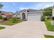 Charming single-Gathering home with a well-manicured lawn and a two-car garage at 826 Jade Forest Ave, Orlando, FL 32828