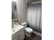 Bathroom with a tiled shower and a modern vanity at 9400 Se 119Th St, Belleview, FL 34420