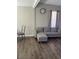 Cozy living room featuring a comfortable sofa and natural light at 9400 Se 119Th St, Belleview, FL 34420