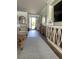 Light-filled foyer featuring hardwood floors, modern decor, and a view to the outside at 9872 Sw 75Th Street Rd, Ocala, FL 34481