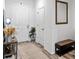 Inviting entryway with neutral colors, decor, and a storage bench at 308 Rustic Loop, Sanford, FL 32771