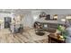 A spacious living area showcases hardwood floors, contemporary furnishings, and a welcoming ambiance at 308 Rustic Loop, Sanford, FL 32771