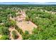An aerial view highlighting property boundary with home and outbuildings at 32510 Wolf Branch Ln, Sorrento, FL 32776