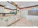 Bright bathroom featuring double sinks, granite countertops, and a jacuzzi tub at 32510 Wolf Branch Ln, Sorrento, FL 32776