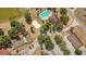 Community aerial showcasing pool, tennis court, basketball court, and sand volleyball court at 516 Bahia Cir # B, Ocala, FL 34472