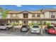 Exterior view of a two-story apartment building with covered parking at 516 Bahia Cir # B, Ocala, FL 34472