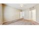 This bedroom has carpet, a ceiling fan and doorways to another room and closet at 5512 Metrowest Blvd # 203, Orlando, FL 32811
