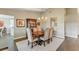Formal dining room featuring hardwood floors and stylish chandelier at 6054 Tarawood Dr, Orlando, FL 32819
