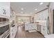Bright, updated kitchen featuring stainless appliances, counter seating, and breakfast nook at 6054 Tarawood Dr, Orlando, FL 32819
