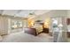 Large main bedroom with sitting area and French door access to patio at 6054 Tarawood Dr, Orlando, FL 32819