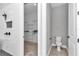 Modern bathroom featuring a walk-in shower, closet, and a toilet room at 6725 Sw 131St Cir, Ocala, FL 34481