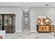 Long hallway featuring decorative accents and wood-look floors at 6725 Sw 131St Cir, Ocala, FL 34481