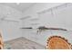 Walk-in closet with adjustable shelving and a light wood floor, basket accents at 6725 Sw 131St Cir, Ocala, FL 34481
