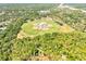Aerial view showcasing multiple baseball diamonds within the community, ideal for sports and recreation at 819 Haulover Dr, Altamonte Springs, FL 32714