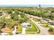 An aerial view of a single-Gathering home with a pool in a lush residential area at 819 Haulover Dr, Altamonte Springs, FL 32714