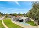 Exterior aerial view showing home, backyard pool, solar panels, and fenced perimeter at 819 Haulover Dr, Altamonte Springs, FL 32714