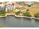 Aerial view showcases a waterfront gazebo within a community, offering scenic views and a peaceful retreat at 819 Haulover Dr, Altamonte Springs, FL 32714