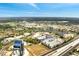An aerial view of a multi-lane highway surrounded by lakes, condos, and commercial real estate at 819 Haulover Dr, Altamonte Springs, FL 32714