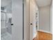 Hallway with access to a bathroom and bedroom with wood-look floors at 819 Haulover Dr, Altamonte Springs, FL 32714