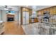 Spacious kitchen open to the living area features wood cabinets and stainless steel appliances at 819 Haulover Dr, Altamonte Springs, FL 32714