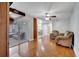 Bright living room with a fireplace, furniture, sliding doors to the patio, and dining area at 819 Haulover Dr, Altamonte Springs, FL 32714