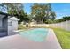 Backyard pool features a large patio and well-maintained lawn surrounded by a white fence at 819 Haulover Dr, Altamonte Springs, FL 32714