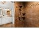 Beautiful tile shower with mosaic accents, built-in shelving, and modern fixtures at 955 Seminole St, Clermont, FL 34711